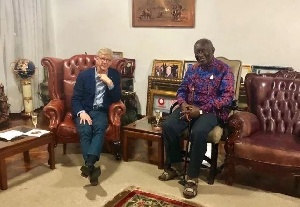 Arsene Wenger (L) with Former President John Agyekum Kufuor (R)