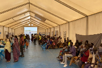Families gather at a WFP centre in Renk, South Sudan, after fleeing Sudan