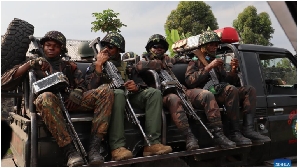 Soldiers are seen on a vehicle in Sake, Eastern DRC on February 11, 2024