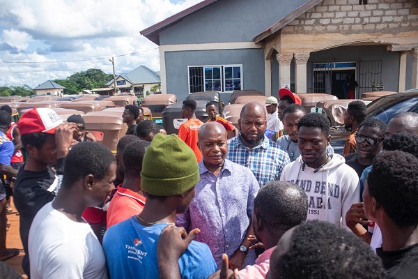 The NPP chairman engaging the 'pragya' riders in the Bono region