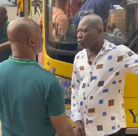 Langabel and Kwasi Appiah interacting at the Accra Sports Stadium