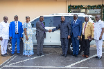 Rew Wengam presenting the vehicle to Rev. Moses Nasimong