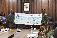 NIB Managing Director Presenting the GHS 1 million to the Chief of Defence Staff