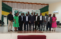 Mr. Jinapor in group photo with management of UMaT at the conference