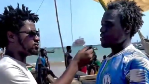 Kwamena (R) was aboard a fishing canoe named 'Second Chance' when it drifted into Beninese waters
