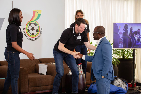 GFA President, Kurt E. S. Okraku exchanging pleasantries with some officials