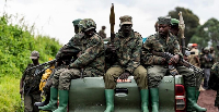 Rwandan soldiers seen siting in a truck