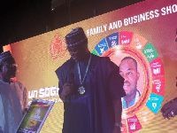 Dr. Abdul Razak Toure being presented with his award in Nigeria