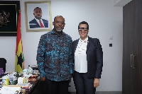 Ms. Aleshia Duncan in a pose with the Minister of Energy, Dr. Matthew Opoku Prempeh