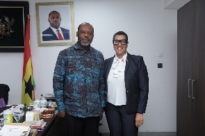 Ms. Aleshia Duncan in a pose with the Minister of Energy, Dr. Matthew Opoku Prempeh