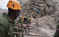 Security forces and civil defence at the multistorey building collapse in Nairobi on Friday