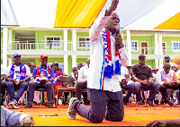 Ralph Poku-Adusei, knelt to solicit support for Dr. Mahamadu Bawumia