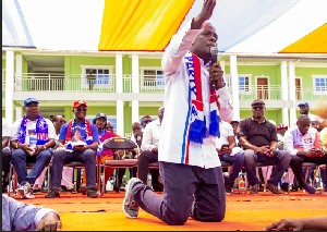 Ralph Poku-Adusei, knelt to solicit support for Dr. Mahamadu Bawumia