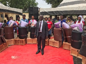 Lawyer Dickson Osei-Asibey in group photo with the beneficiaries