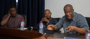 Dr. Prince Kludjeson (right