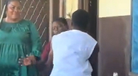 A picture of the man huging his son