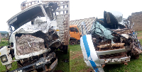 A combination of photos taken on March 21, 2026 shows the wreckage of a taxi and a lorry