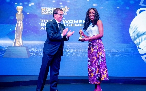Sheila Wristberg receiving her award during the event in Dar Es Salaam