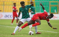 Asante Kotoko's Nicholas Mensah in action against Samartex