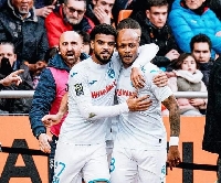 Andre Ayew  celebrating his goal with his teammate