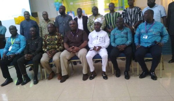Edward Ekow Obeng-Kenzo, seated middle on the first roll with some staff members