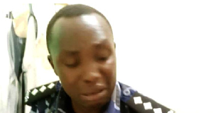 Mr Rogers Wamono reacts after his fingers were cut off by a suspect he had gone to arrest