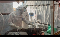 A health worker attend to an Ebola patient at the Rwampara treatment Center in Ituri, June 18 2026
