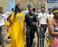 Yaw Yeboah and his girlfriend arriving in Ghana