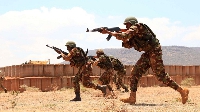 Soldiers in action during training at the Kenya Defence Forces School of Infantry in Isiolo, Kenya