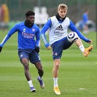 Thomas Partey (left) and Martin Odegaard