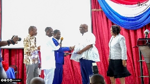 Joe Ghartey (second right) receiving his forms