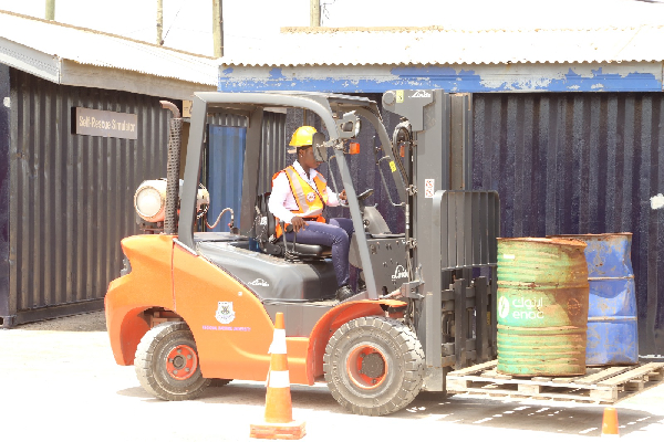 One of the women operating the heavy-duty machines