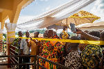 Chief of Sefwi Paboase, Nana Frimpong Manso Ababio II cutting the ribbon