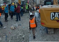 Rescue workers at the site of the Hayat Renaissance building