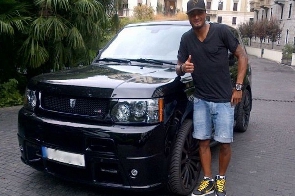 Kevin-Prince Boateng with one of his cars