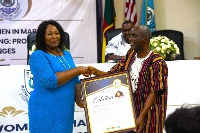 Esther Gyebi-Donkor receivingthe citation