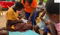 Some of the student learning how to make reusable sanitary pads