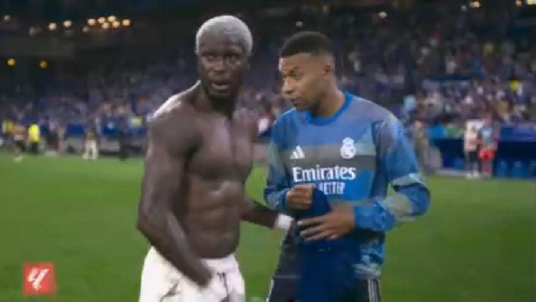 Ghanaian midfielder Kwasi Sibo (L) French forward Kylian Mbappe (R)