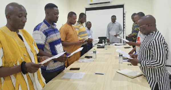 Members taking the official oaths