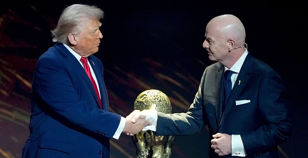 FIFA President Gianni Infantino, right, awards President Donald Trump with the FIFA