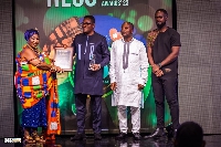 Dr Noble John Watson Otumfuo, CEO of Mayfair Estates, second left, receiving his award with his team