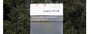 A general view shows the sign ArcelorMittal at its Vereeniging plant