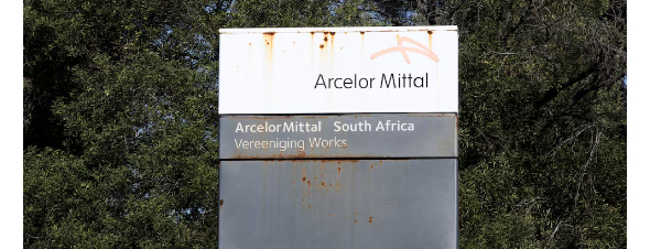 A general view shows the sign ArcelorMittal at its Vereeniging plant