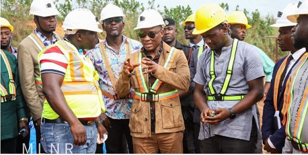 George Mireku Duker with some miners