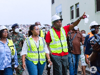 The minister (R) with others captured at Jamestown Waste Transfer Station