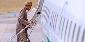 President Buhari boarding a plane