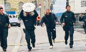 The four policemen who carried the trophy