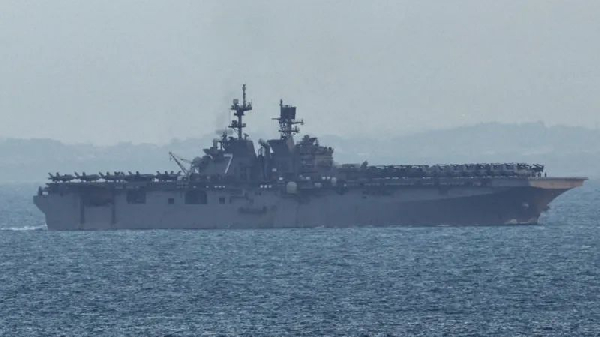 The USS Tripoli is an amphibious assault ship carrying around 3,500 marines and sailors