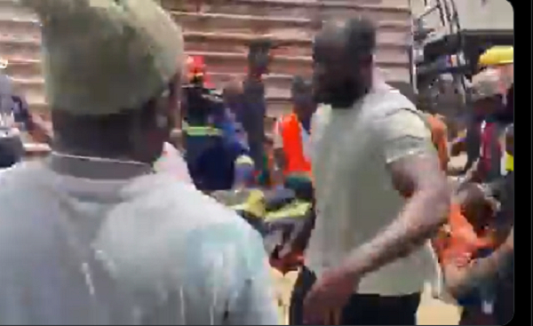 A snapshot showing emergency personnel carrying the rescued man to the hospital.