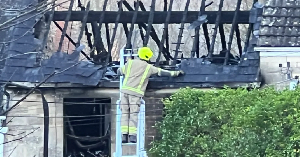 A woman in her 40s and her two young children were killed in the Boxing Day blaze